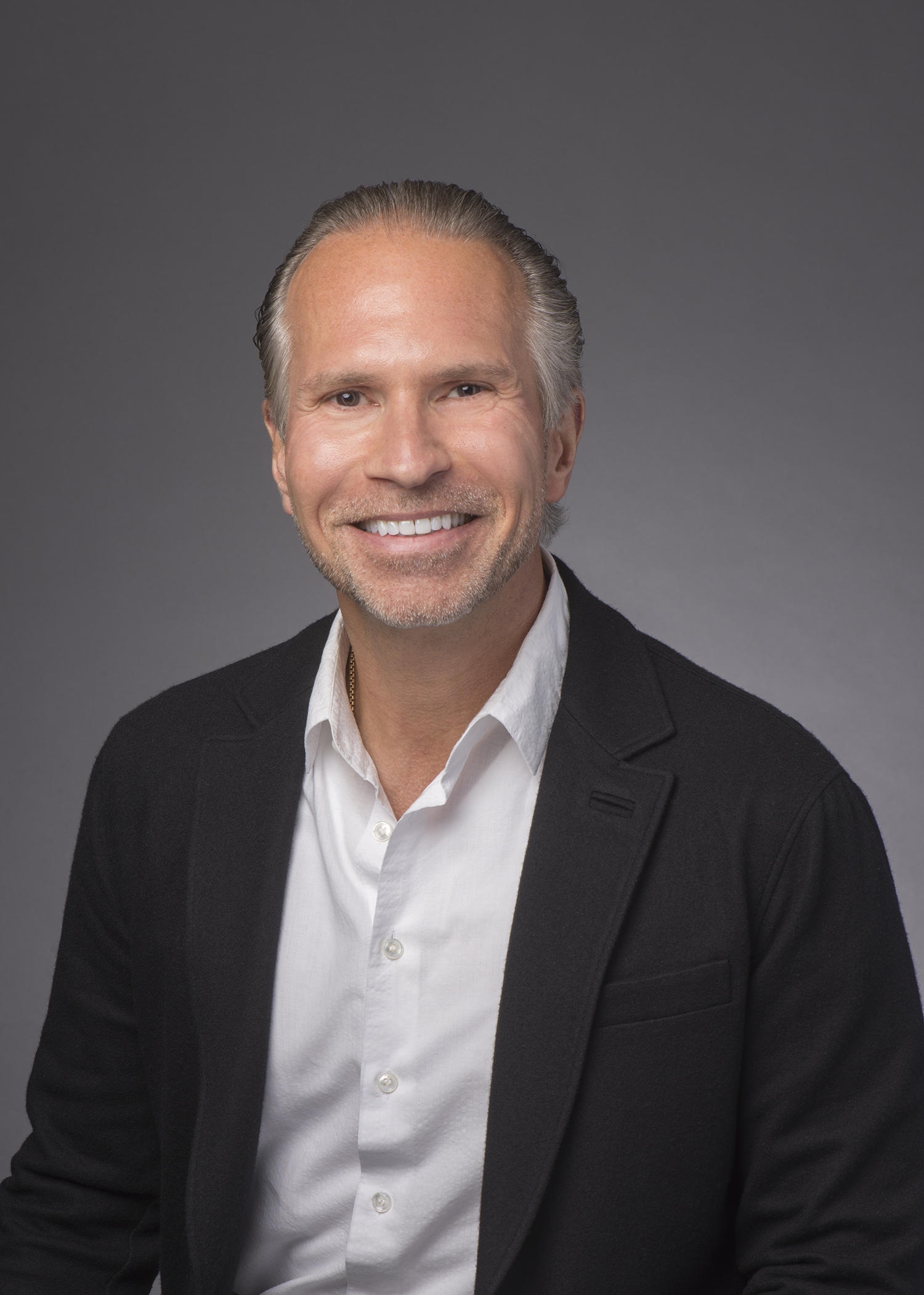 Professional headshot of Paul Mashni, CEO and Founder of Professional Equity Management